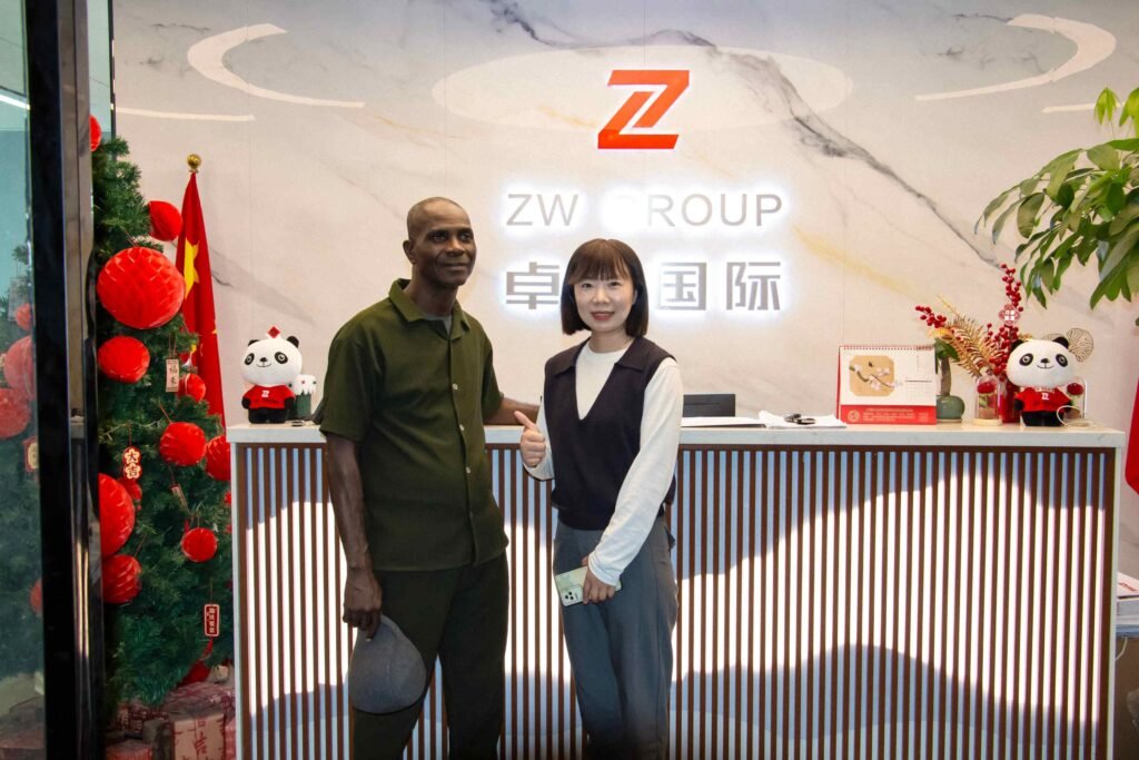 Nigerian client visiting ZW factory and confirming fuel tanker trailer purchase with ZW team