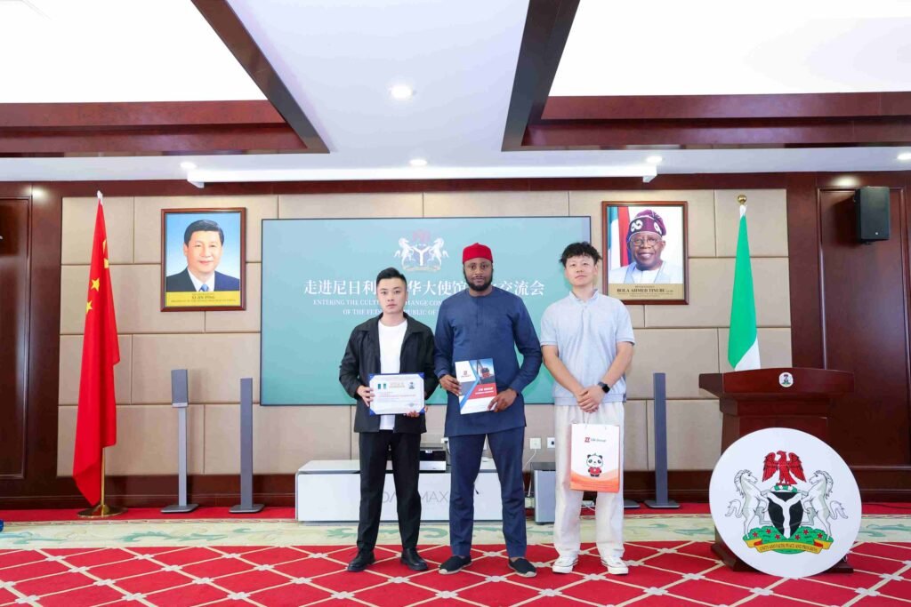 ZW Group team with Nigerian officials holding the recommended partner certificate for petroleum and liquid transport equipment.