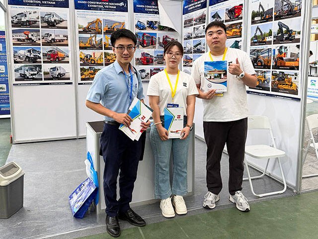 ZW Tanker team and regional consultant holding product brochures at Booth A41 during Contech Vietnam 2026.